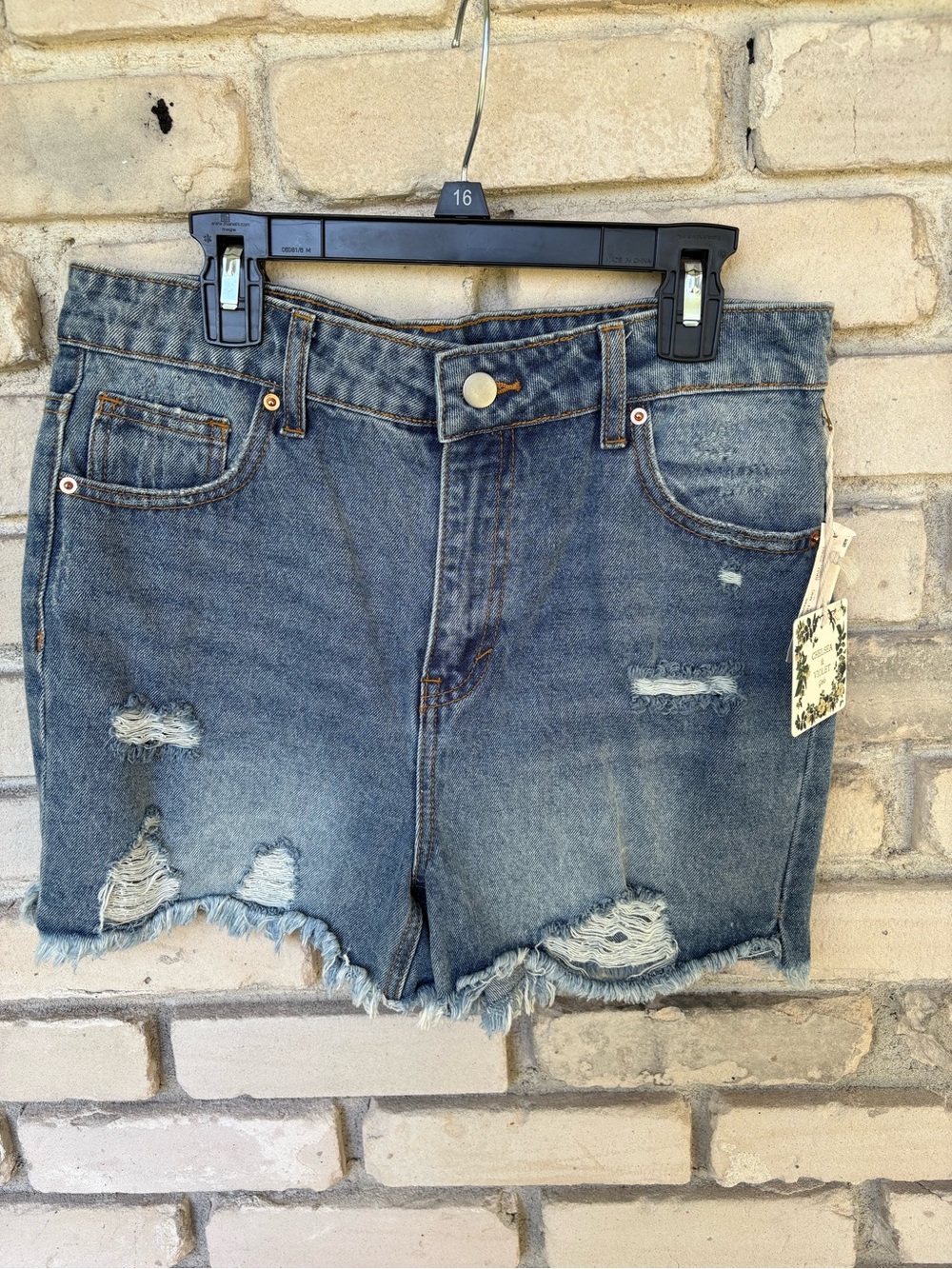 Chelsea & Violet Distressed Blue Denim girls Shorts.  fringe hem